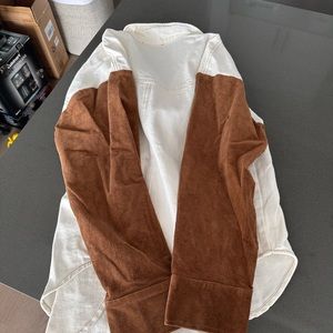 White jean jacket with corduroy sleeves